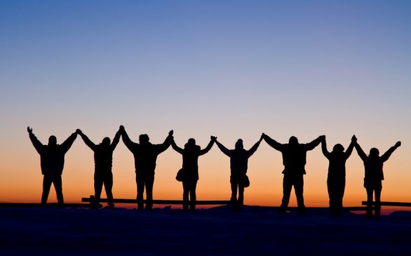 group of climbers celebrating