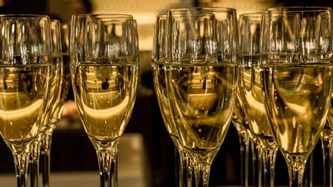 filled champagne glasses