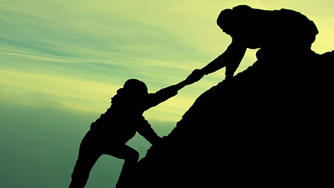 climbers helping each other