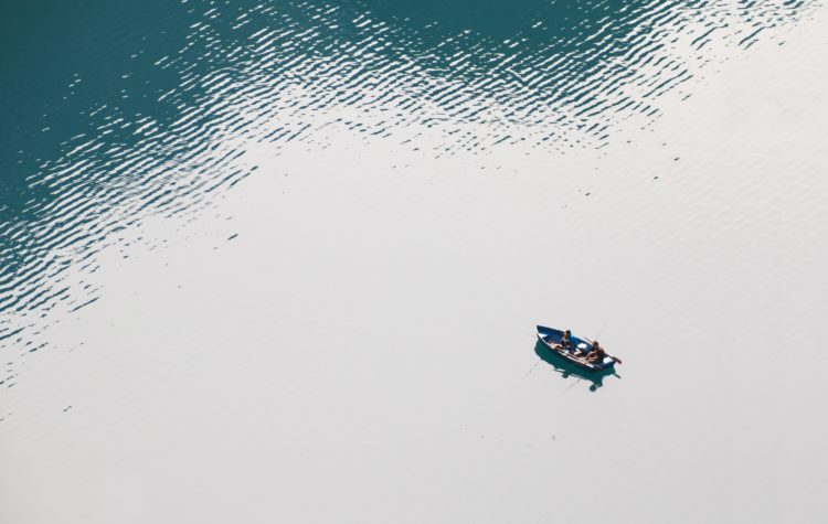 aerial view of a boat on a lake
