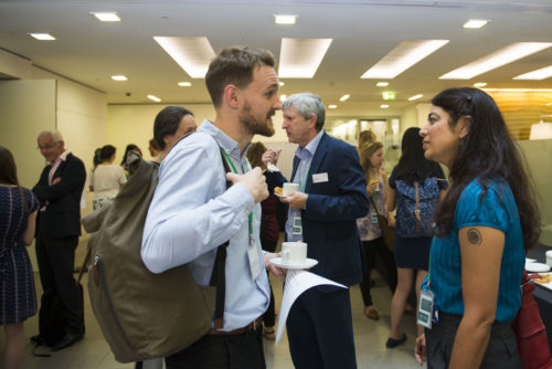 people talking at an event