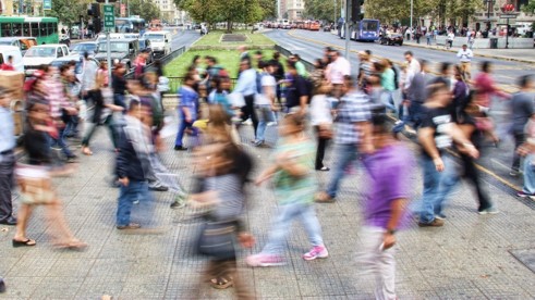 people walking over road