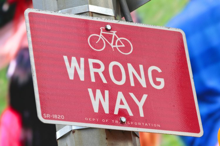 Wrong way road sign