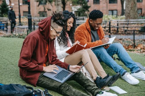 3 people using laptops