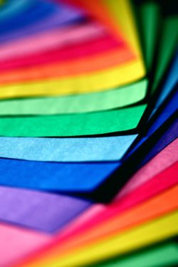 A pile of paper in a rainbow