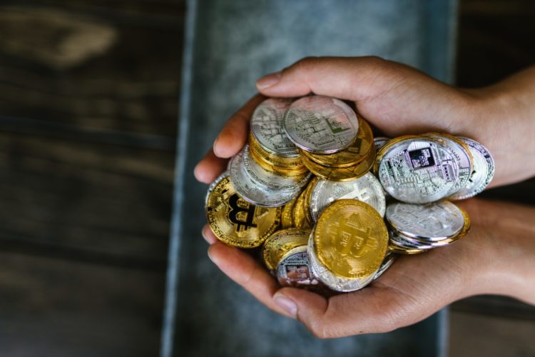 hands full of coins