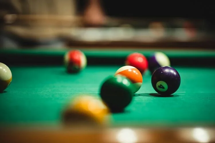Billiard balls on a pool table.